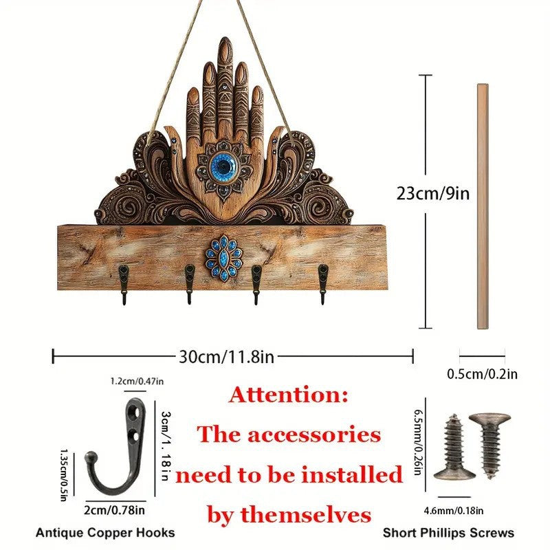 Decorative wall hook with hand design and measurements on a white background