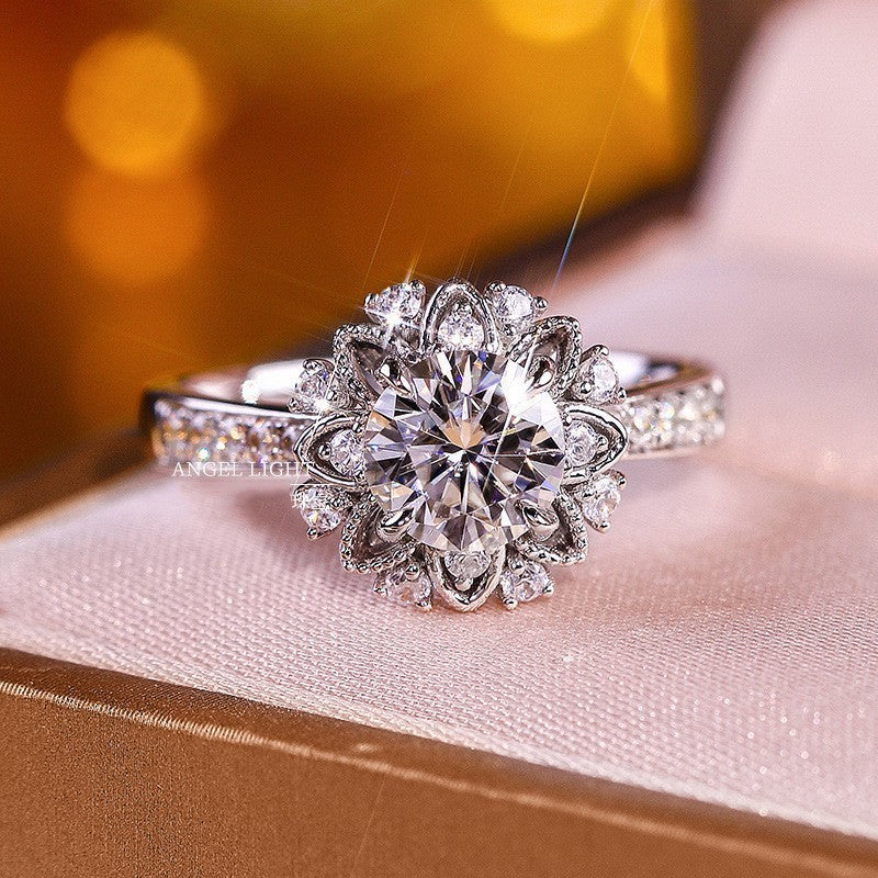 Diamond ring on a soft fabric background with a blurred yellow background